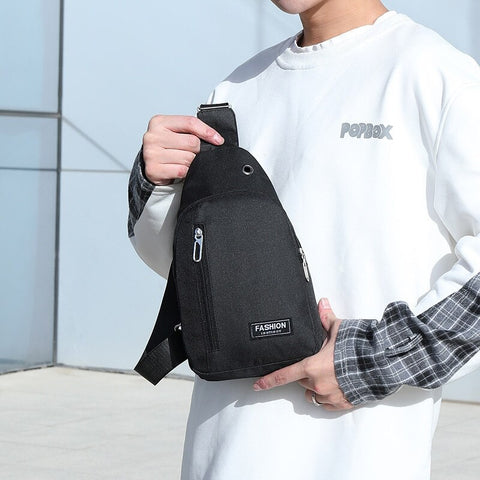 Cross-Shoulder Backpack in Black Oxford - Practicality and Style